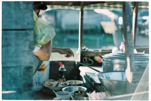Một quầy đồ ăn sáng trong chợ nổi Cái Răng - Cần Thơ