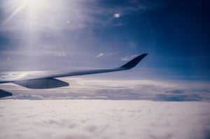 Airplane Wing and Clouds