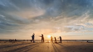 Morning Exercises On The Beach