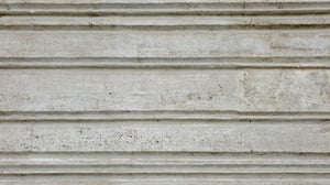 Relief of concrete gray wall with lines