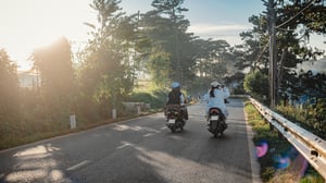 Young  people traveling by bike